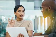 GettyImages-1322304331 coworkers tablet