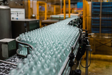 Production line, juice bottling-GettyImages-1147717291