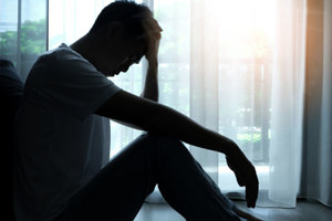 GettyImages-1886286537-sad-depressed-anxious-man