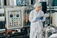 GettyImages-1849575910-scientist-laboratory-lab-coat-inspection