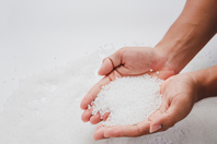 GettyImages-2185182486-hand-holding-thermoplastics-pellets