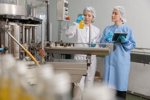 Scientist worker checking the quality of machine system at the industrial factory-GettyImages-2268908296
