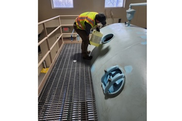 WaterSurplus technician adds chlorine to OxiPlus12 system for final sterilization and activation of the new media WaterSurplus technician adds chlorine to OxiPlus12 system for final sterilization and activation of the new media