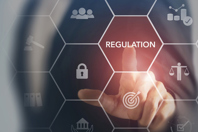 Understanding Decentralized Clinical Trials: FDA vs. EMA Fundamentals GettyImages-1468153601-regulation-honeycomb-hand-target
