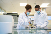 A Proven AAV Platform To Drive Down Program Costs And Maximize Speed GettyImages-1371707479-lab-mask-team-partnership