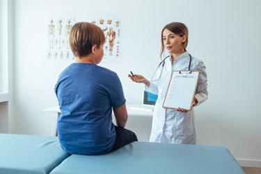 Dietitian holding diet plan-GettyImages-1425188874
