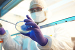 Cleanroom Gowning Compliant With EU GMP Annex 1: An Overview Pipette clean room laboratory cell and gene GettyImages-530817998