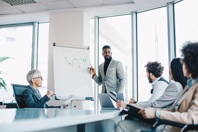 iStock-1205667168-meeting-presentation-group-discussion