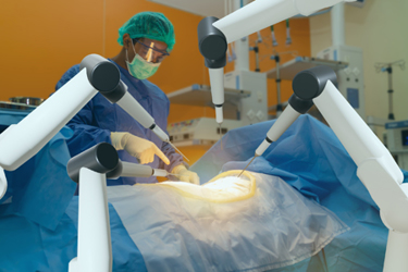 robotic machine doctors performing surgery iStock-1185259031