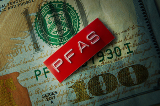 PFAS Label on hundred dollar bill-GettyImages-2193126716