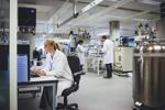 Your Journey To GMP With Emphasis On Linker Payload Development Scientists working in lab-GettyImages-542935478