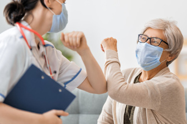 iStock-1280184645-patient-masks-pandemic-doctor
