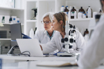 GettyImages-1426756188-scientists-in-lab-with-computer-analyzing