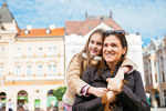 EU - young girl and mother in town square 2 (high res)