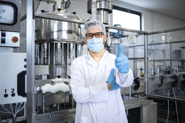 worker in pharmaceutical factory-GettyImages-1416208654