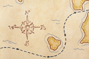 compass on treasure map-GettyImages-157588143