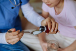 GettyImages-1480549690-nurse-giving-medicine-to-children