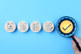 GettyImages-2156677072-magnifying-glass-compliance-quality-blocks-blue-background GettyImages-2156677072-magnifying-glass-compliance-quality-blocks-blue-background