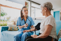 5 Essential Capabilities For Decentralized Clinical Trials GettyImages-1719538555 in home nurse visit patient