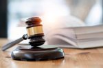 GettyImages-1411630763 Wooden Judge Gavel On A Table