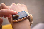 Woman Uses Smartwatch GettyImages-1354400557
