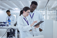 How To Solve The Big Challenges Of Cell And Gene Therapy Manufacturing scientific project using digital tablet-GettyImages-1389831861