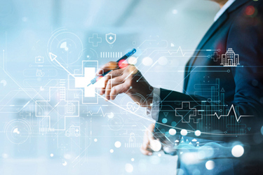 analyzing graph data and growth of healthcare-GettyImages-1392069635 analyzing graph data and growth of healthcare-GettyImages-1392069635