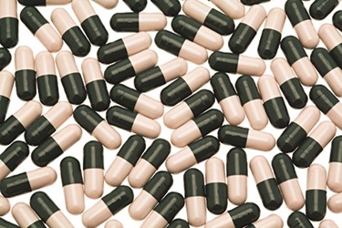 iStock_pills_capsules_greenandwhite_450x300