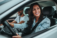 Couple driving in car-GettyImages-1320539830