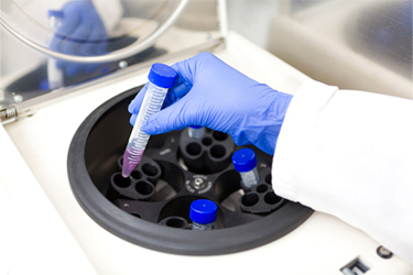GettyImages-152946199-scientist-hand-test-centrifuge-tube GettyImages-152946199-scientist-hand-test-centrifuge-tube