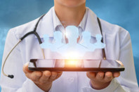 Harnessing Predictive Modeling To Overcome Trial Enrollment Challenges GettyImages-698091284-patient-digital-tablet-recruitment
