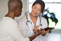 Choose An Oncology Offering Designed Around Patient Experience  GettyImages-1370896437-doctor-patient-oncology-cancer