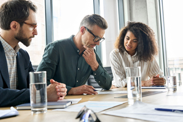 analyzing financial report-GettyImages-1331101172 analyzing financial report-GettyImages-1331101172