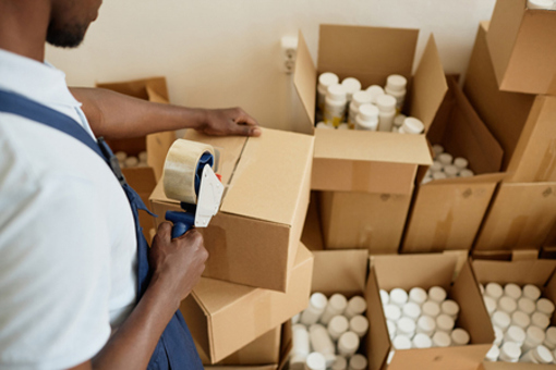 packaging department at factory, shipping services-GettyImages-1572384472