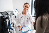 HCP speaking with a patient in an exam room (high res) (1)