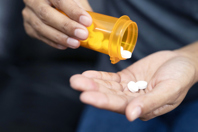 GettyImages-1220131127-pill-medicine-patient