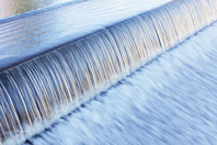 2025 Water Forecast: Transition, Changes, And Trends Waterfall Water Over Dam-GettyImages-157674517
