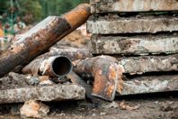 GettyImages-1347645451 rusted pipes