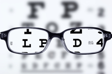Eyeglasses and eye chart-GettyImages-136507711