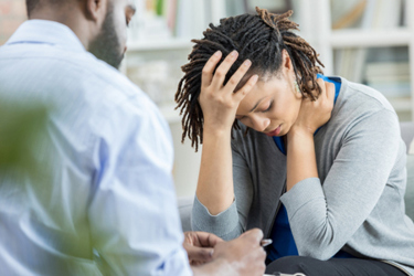 distraught woman in therapy session-GettyImages-973286132 distraught woman in therapy session-GettyImages-973286132