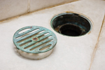 Let's Clean Up That Bioburden — The Aseptic Suite's Persistent Plague Bathroom drain-GettyImages-535770075