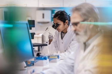 scientist in lab microscope-GettyImages-1867575565 scientist in lab microscope-GettyImages-1867575565