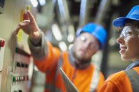 Teamwork in boiler room-GettyImages-578805044