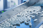 GettyImages-1465073079-conveyor-belt-tablets-manufatcuring