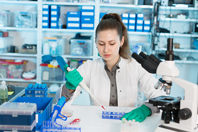 Scientist laboratory pippette research