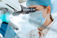 Viruses And Viral Vectors, Are They Different? GettyImages-1287800857 Scientist Using A Microscope In A Laboratory