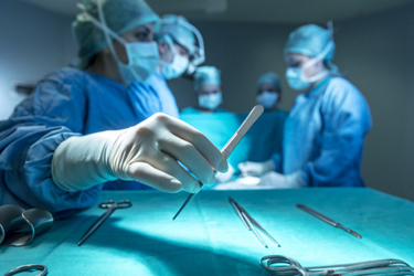 Surgeons during operation-GettyImages-909209122