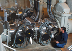 Flat Creek WRF Plant Manager Michael West examines one of six Aquionics InLine UV disinfection units at the Gainesville, GA treatment facility.