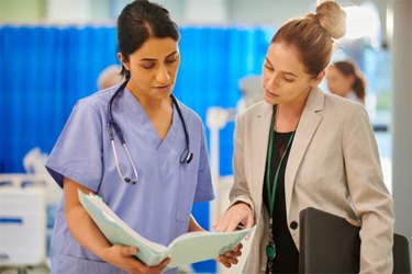 GettyImages-2163190867-hospital-doctor-administrator-discussion GettyImages-2163190867-hospital-doctor-administrator-discussion