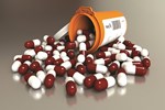 ChemoCentryx Gets FDA Orphan Status For Kidney Disease Drug red white pills bottle 450x300
